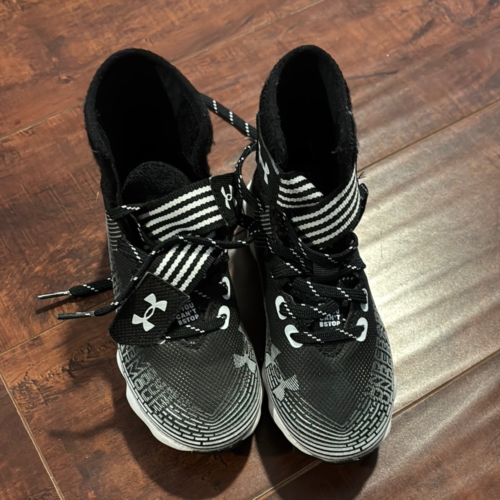 Under Armour Kids Black and White spots cleats for flag football